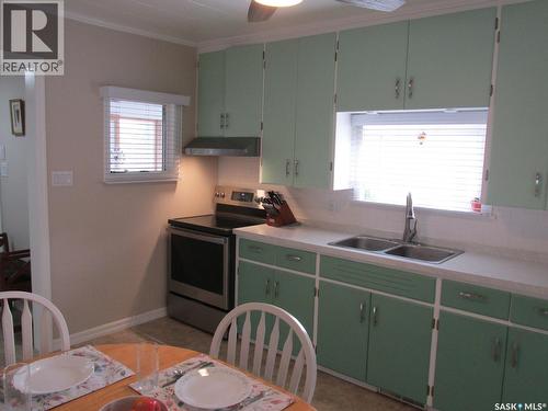 302 Rustad Avenue, White Fox, SK - Indoor Photo Showing Kitchen With Double Sink