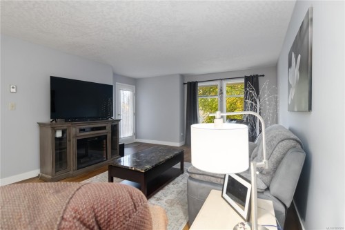 201-2311 Mills Rd, Sidney, BC - Indoor Photo Showing Living Room