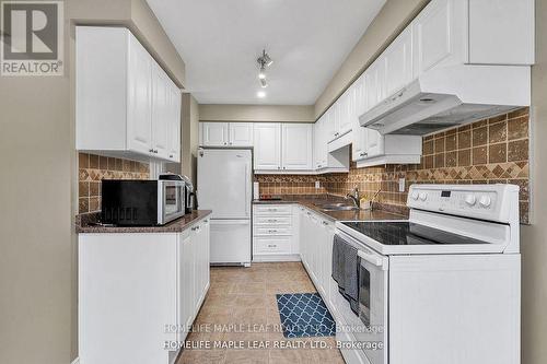 28 - 308 Conway Drive, London South, ON - Indoor Photo Showing Kitchen With Double Sink