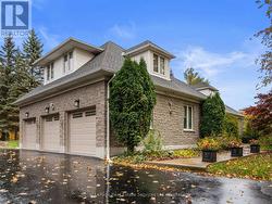 Winding Driveway leads to 3 csr Garage - 