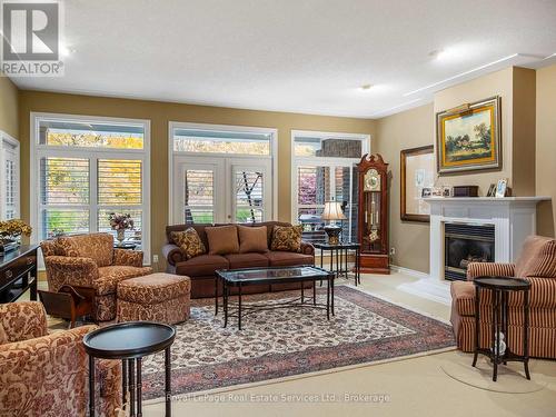 Living Room w/gas Fireplace - 47 Fox Run Drive, Puslinch, ON - Indoor Photo Showing Living Room With Fireplace
