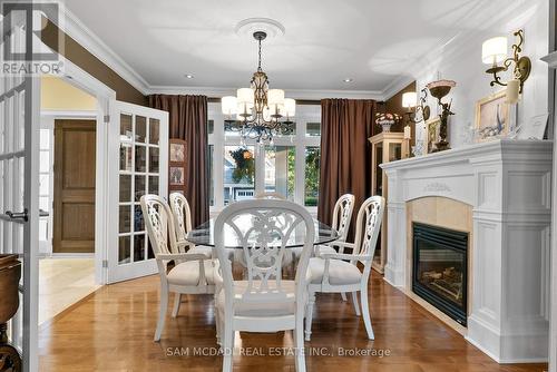 1522 Glenhill Crescent, Mississauga, ON - Indoor Photo Showing Dining Room With Fireplace