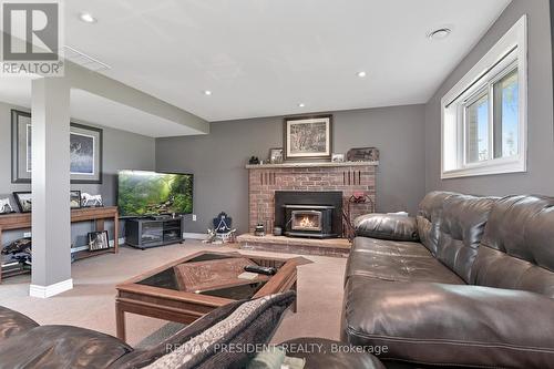 40233 Forks Road S, Wainfleet, ON - Indoor Photo Showing Living Room With Fireplace