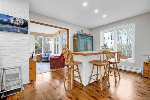 Coin-repas - 326 Ch. Filion, Sainte-Anne-Des-Lacs, QC - Indoor Photo Showing Dining Room With Fireplace