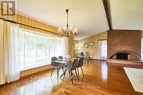 1 Goodland Gate, Toronto (Agincourt South-Malvern West), ON - Indoor Photo Showing Dining Room With Fireplace