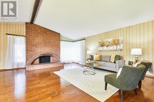 1 Goodland Gate, Toronto (Agincourt South-Malvern West), ON - Indoor Photo Showing Living Room With Fireplace