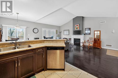 3563 Dominion Road, Fort Erie (Ridgeway), ON - Indoor Photo Showing Kitchen With Fireplace With Double Sink