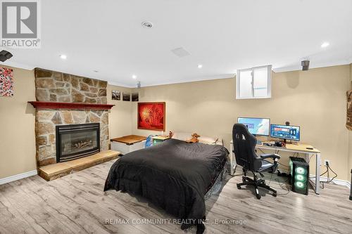 31 Withay Drive, Ajax, ON - Indoor Photo Showing Bedroom With Fireplace