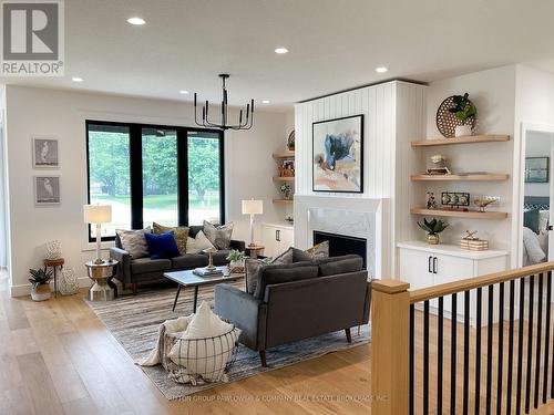 Photos shown of model home for reference only. - Lot#101 - 56 Allister Drive, Middlesex Centre (Kilworth), ON - Indoor Photo Showing Living Room With Fireplace