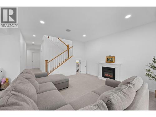 921 Mt Griffin Road Lot# 031-034-98, Vernon, BC - Indoor Photo Showing Living Room With Fireplace