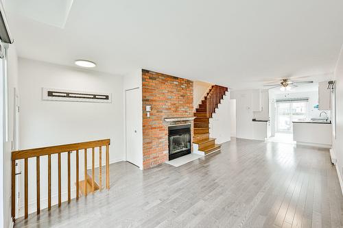 Salon - 319  - 321 Rue Blainville E., Sainte-Thérèse, QC - Indoor Photo Showing Living Room With Fireplace