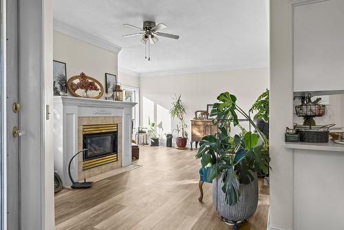 203-1940 Richter Street, Kelowna, BC - Indoor With Fireplace