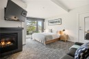 306-596 Marine Dr, Ucluelet, BC  - Indoor Photo Showing Bedroom With Fireplace 