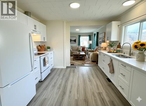 Kitchen digitally staged - 1021 Willow Street, Okanagan Falls, BC - Indoor Photo Showing Kitchen With Double Sink