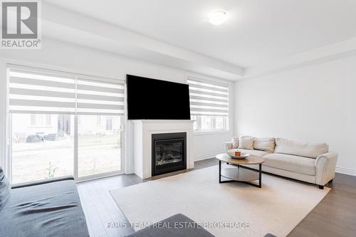 7 Lisa Street, Wasaga Beach, ON - Indoor Photo Showing Living Room With Fireplace