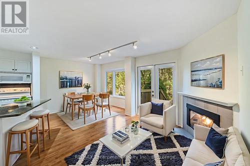 5 - 2065 Sixth Line, Oakville (Ro River Oaks), ON - Indoor Photo Showing Living Room With Fireplace