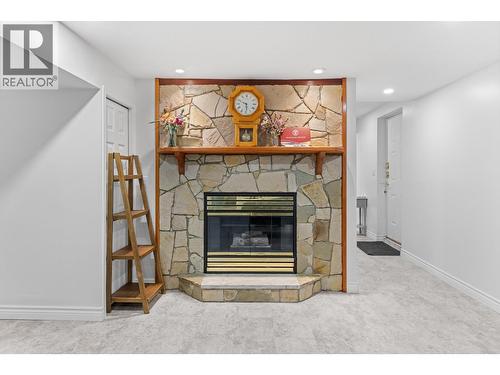 1660 Sonora Drive, Kelowna, BC - Indoor Photo Showing Other Room With Fireplace