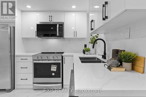 686 Wickens Avenue, Burlington, ON - Indoor Photo Showing Kitchen With Double Sink