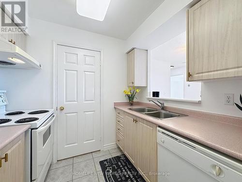 708 - 5039 Finch Avenue E, Toronto, ON - Indoor Photo Showing Kitchen With Double Sink