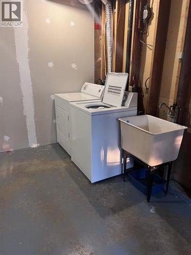 74 5550 Simpson Trail, Fort Nelson, BC - Indoor Photo Showing Laundry Room