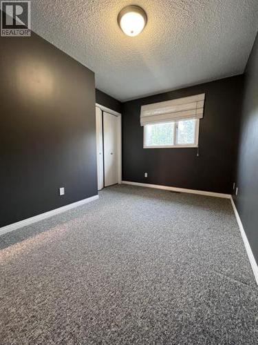 74 5550 Simpson Trail, Fort Nelson, BC - Indoor Photo Showing Other Room