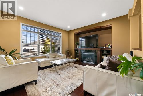 4638 Hames Crescent, Regina, SK - Indoor Photo Showing Living Room With Fireplace