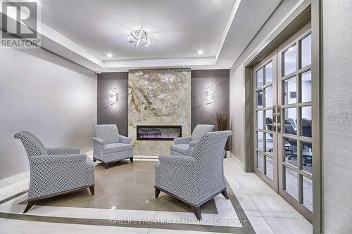 704 - 20 Baif Boulevard, Richmond Hill, ON - Indoor With Fireplace