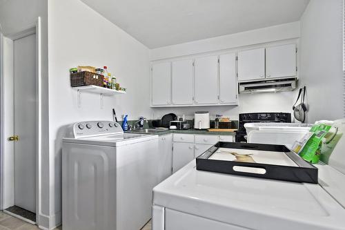 Cuisine - 5890Z Rue Chauveau, Montréal (Mercier/Hochelaga-Maisonneuve), QC - Indoor Photo Showing Laundry Room