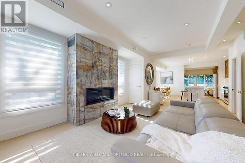 22 Pitt Avenue, Toronto, ON - Indoor Photo Showing Living Room With Fireplace