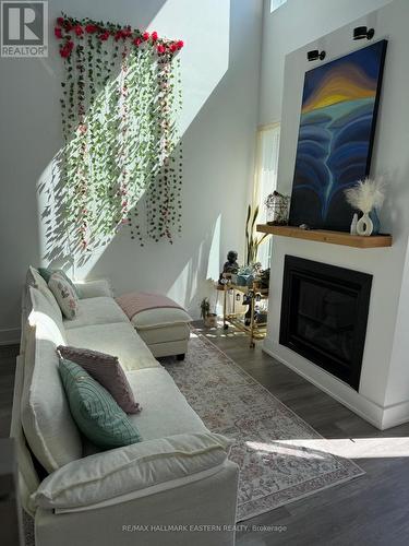 4 - 19 West Street N, Kawartha Lakes (Fenelon Falls), ON - Indoor Photo Showing Living Room With Fireplace