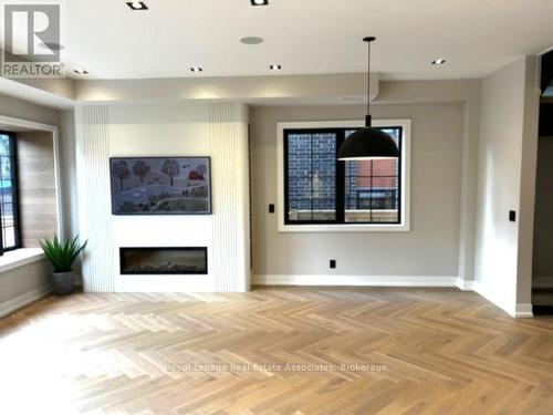 Living and Dining - 1006 Garrard Avenue, Mississauga, ON - Indoor Photo Showing Other Room With Fireplace