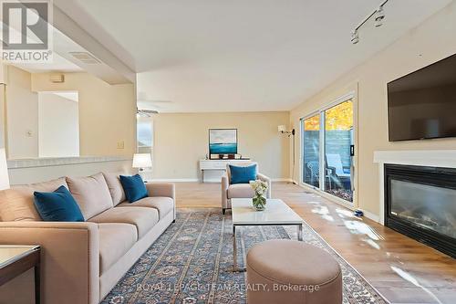 1094 Alenmede Crescent, Ottawa, ON - Indoor Photo Showing Living Room With Fireplace