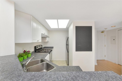 1208-930 Yates St, Victoria, BC - Indoor Photo Showing Kitchen With Double Sink