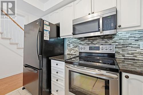 Gourmet Kitchen Features Granite Countertops - 1324 Ashwood Terrace, Oakville, ON - Indoor Photo Showing Kitchen