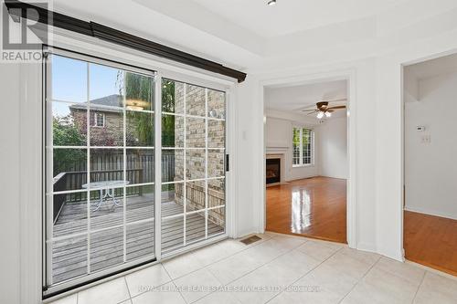 Dining Area with a Sliding Door Walkout to Deck - 1324 Ashwood Terrace, Oakville, ON - Indoor Photo Showing Other Room