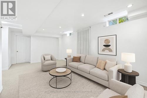 Virtually Staged Recreation Room w/Berber Brdlm. - 1324 Ashwood Terrace, Oakville, ON - Indoor Photo Showing Living Room