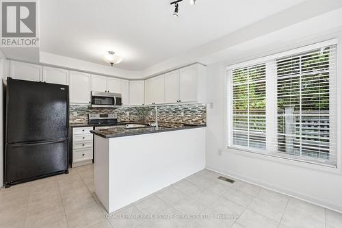 Gourmet Kitchen Features Granite Countertops - 1324 Ashwood Terrace, Oakville, ON - Indoor Photo Showing Kitchen With Upgraded Kitchen