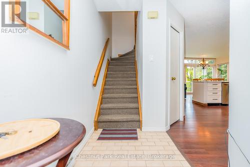 Front foyer entrance with stairs to second floor - 97 - 18 Ramblings Way, Collingwood, ON - Indoor Photo Showing Other Room