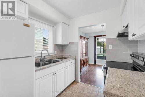 7734 Benavon Road, Mississauga, ON - Indoor Photo Showing Kitchen With Double Sink With Upgraded Kitchen