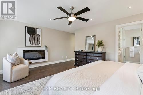105 Twenty Second Street, Toronto, ON - Indoor Photo Showing Bedroom With Fireplace