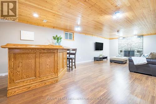 21 Maryjane Road, Tiny, ON - Indoor With Fireplace