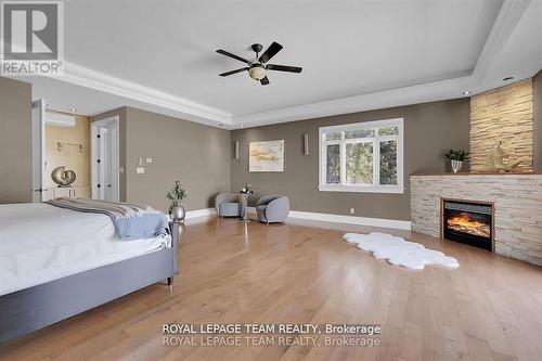 3886 Armitage Avenue, Ottawa, ON - Indoor Photo Showing Bedroom With Fireplace