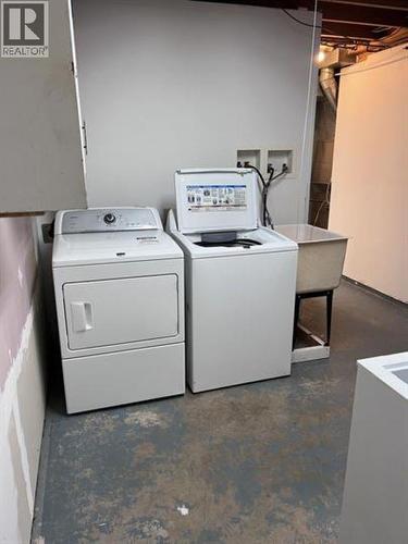 84 5550 Simpson Trail, Fort Nelson, BC - Indoor Photo Showing Laundry Room