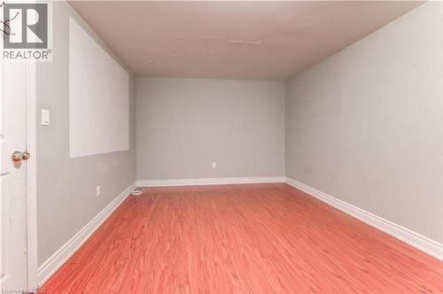 Empty room featuring light wood-type flooring and baseboards - 685 Briardean Road Unit# Lower, Cambridge, ON - Indoor Photo Showing Other Room