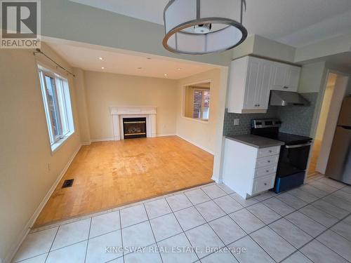 4859 Marble Arch Mews, Mississauga, ON - Indoor Photo Showing Kitchen With Fireplace