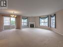 2255 Atkinson Street Unit# 301, Penticton, BC  - Indoor Photo Showing Living Room With Fireplace 