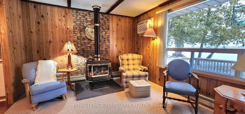 117 Clifford Drive, Kawartha Lakes, ON - Indoor With Fireplace