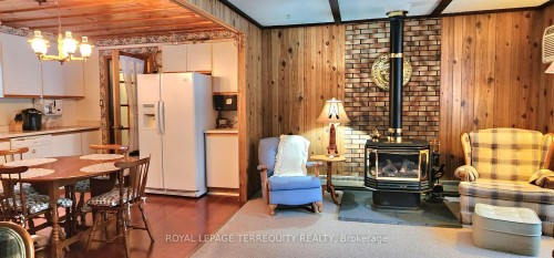 117 Clifford Drive, Kawartha Lakes, ON - Indoor With Fireplace