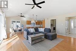 Open concept living room, dining, and kitchen - 