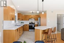 Updated kitchen with newer countertops - 